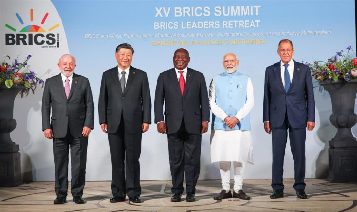 (from left) President of Brazil Lula da Silva, General Secretary of the Chinese Communist Party Xi Jinping, President of South Africa Cyril Ramaphosa, Prime Minister of India Narendra Modi and Foreign Minister of Russia Sergey Lavrov, in a family photograph during the BRICS Leaders Retreat Meeting, at Johannesburg, in South Africa on August 22, 2023. Prime Minister's Office, GODL-India , via Wikimedia Commons