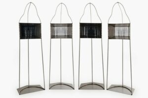 Ornella Rovera, Litanie, 2024, quattro strutture alte cm 180, tecnica fotoceramica e acciaio inox